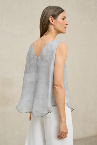 Top Érima gris perla